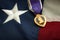 The Purple Heart medal and the American flag