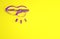 Purple Herpes lip icon isolated on yellow background. Herpes simplex virus. Labial infection inflammation symbol