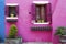 Purple home facade in Burano island, Venice, Italy