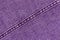 Purple jeans cloth texture with stitch.