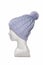 Purple knitted hat on a dummy
