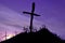 Purple landscape with wooden Cross or crucifix.  Concept for Lent Season, Holy Week, Palm Sunday and Good Friday