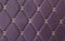 purple leather Mat with straight beige stitching soft leather for machine with textured pattern concept background business