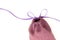 Purple linen pouch tied with a ribbon.