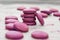 Purple Macaroons on display food photography