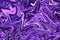 Purple marbling paint swirls background.