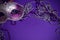 Purple Mardi-Gras or Venetian mask on purple background