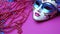 Purple mask, elegant disguise, Mardi Gras celebration generated by AI