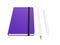 Purple moleskine or notebook with pen and pencil and a black strap front or top view isolated on a white background 3d rendering