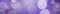 Purple panoramic bokeh lights abstract background.