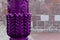 Purple pillar column decorated with patterns of flowers. architecture