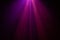 Purple and pink color wide lens projector with light beam for movie and cinema at night . smoke texture spotlight . screening for