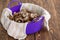 Purple plastic bowl with fresh washed mushrooms