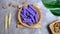 Purple raspberry, Christmas cake on a wooden bowl.