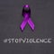 Purple ribbon and text stop violence