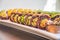 Purple rice sushi roll with mango and avocado for a vegan sushi meal