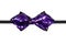 Purple sequins bow tie close up isolated on white background