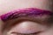 Purple sequins on the eyebrow macro