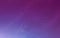 Purple sky. Magic cosmic clouds with stars. Color gradient with constellations. Fantasy wallpaper with northern lights