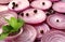 Purple sliced juicy onion pepper and green parsley