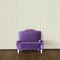 Purple sofa and wallpaper