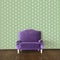 Purple sofa and wallpaper like pine trees
