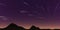 Purple space swirling beautiful galaxy skyscape. Stargaze background. Night sky spinning stars trail texture. Stargazing mountains