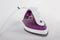 Purple steam iron