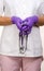 Purple stethoscope and gloves