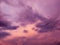 Purple stormy sky with clouds for natural background