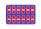 A purple strip of twelve red capsules of medicine pills against a white backdrop