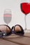 Purple sunglasses & rose wine