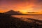 Purple sunset in Amed with the largest volcano on the Agung in Bali, Indonesia