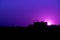 Purple sunset cityscape silhouette