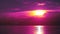 Purple sunset reflection on water surface of sea and cloud on sky