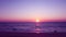 Purple sunset sky with beautiful bright sun light shining through gradient pink horizon