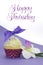 Purple theme cupcake with orchid flower with Happy Thursday sample text