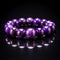 purple tiger eye gemstone bracelet on black background