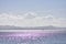Purple and violet reflections on sea surface