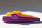 A purple and a yellow musical instrument