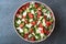 Purslane Salad with Goat Cheese, Cucumber and Tomatoes.