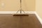 Push Broom on a Newly Installed Laminate Floor and Baseboard