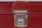 Push latch of the old hardshell suitcase close-up