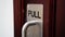 Push and pull sign on a door at a apartment