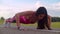 Push ups exercise. Push up woman. Closeup of asian woman pushing on road