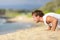 push-ups - man fitness model training on beach