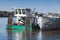 Pusher boat stands moored on Danube river