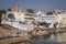 Pushkar ghats and lake during bathing and rituals on a sunny day, Pushkar, Rajasthan, India