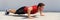 Pushup fitness man banner doing push-ups workout bodyweight exercise on gym floor. Athlete working out chest muscles