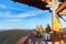 PUSTEVNY, CZECH REPUBLIC, FEBRUARY 16, 2019: Undefined tourists watching nature and walking on a new wooden lookout tower or sky